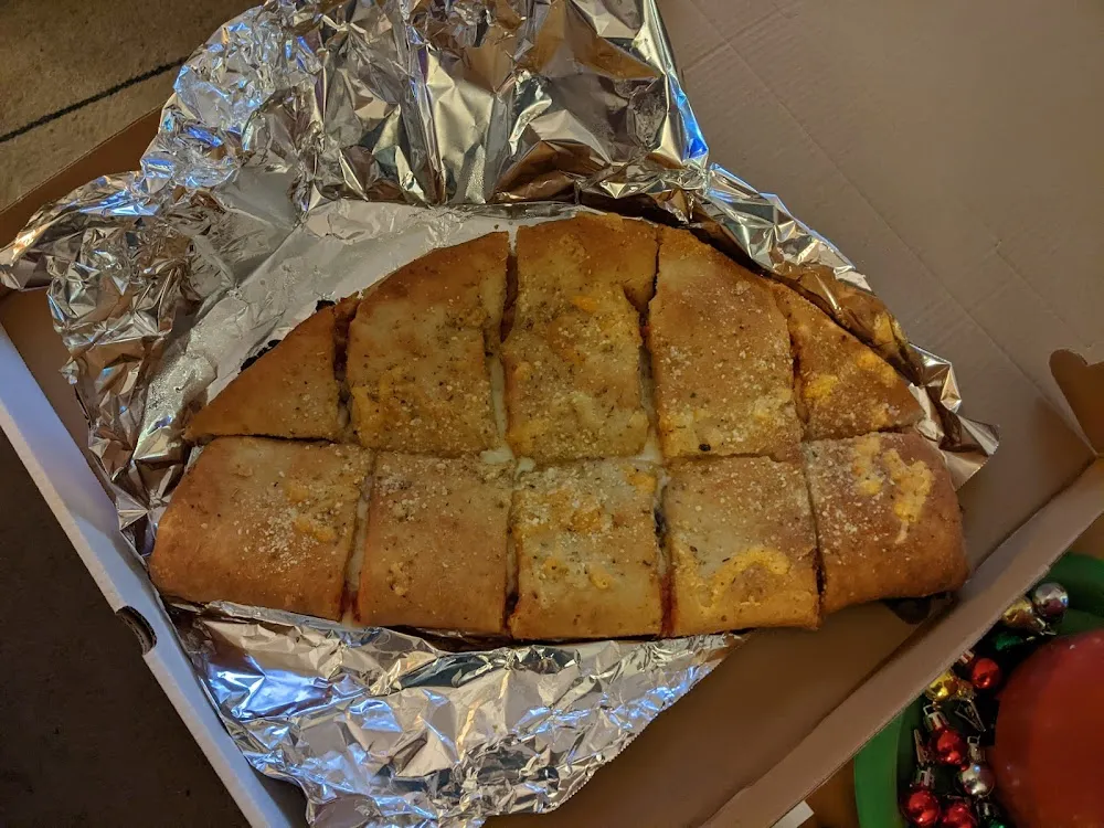 Family Size Foldover Pizza with Extra Cheese Sausage and Mushrooms